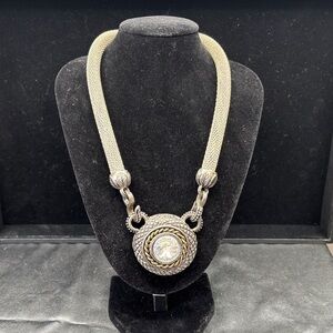 Elegant Silver and Gold Pendant Necklace